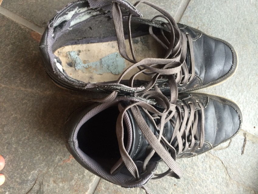 Size 12 left shoe with liner cut out to fit the first AFO brace